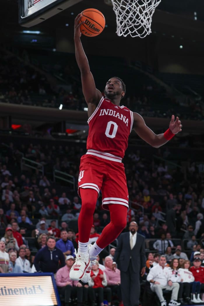 Indiana Hoosiers guard Xavier Johnson (0) lays the ball up during the second half against the Louisville Cardinals at Madison Square Garden.